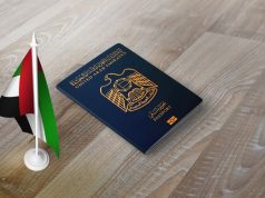 UAE passport besides UAE flag