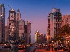 Dubai city view in night lights.