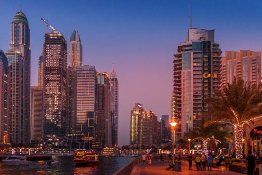 Dubai city view in night lights.