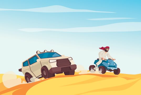 Man on quad bike and SUV driving over desert dunes.