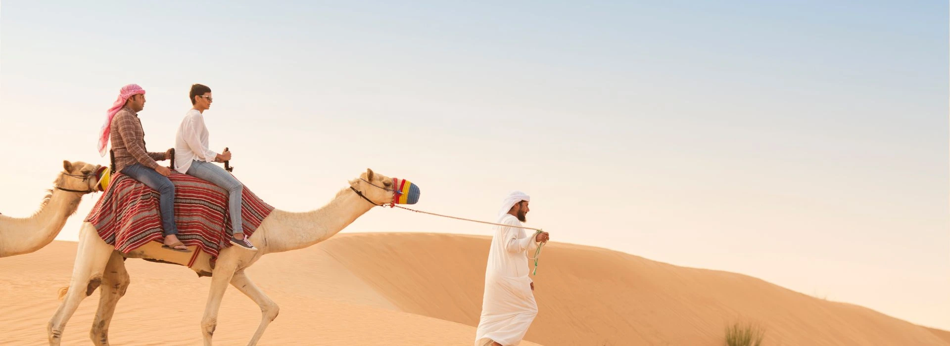 Tourists Riding in the desert Dubai