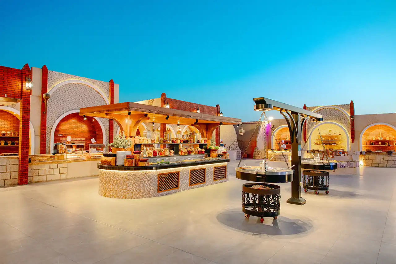 Luxury evening desert safari in Dubai with arranged BBQ buffet dinner setup 